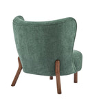 Poltroncina accentuata moderna senza braccioli Camille con seduta imbottita e struttura in legno massiccio