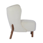 Poltroncina accentuata moderna senza braccioli Camille con seduta imbottita e struttura in legno massiccio