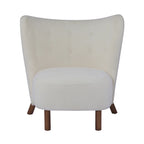 Poltroncina accentuata moderna senza braccioli Camille con seduta imbottita e struttura in legno massiccio
