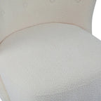 Poltroncina accentuata moderna senza braccioli Camille con seduta imbottita e struttura in legno massiccio