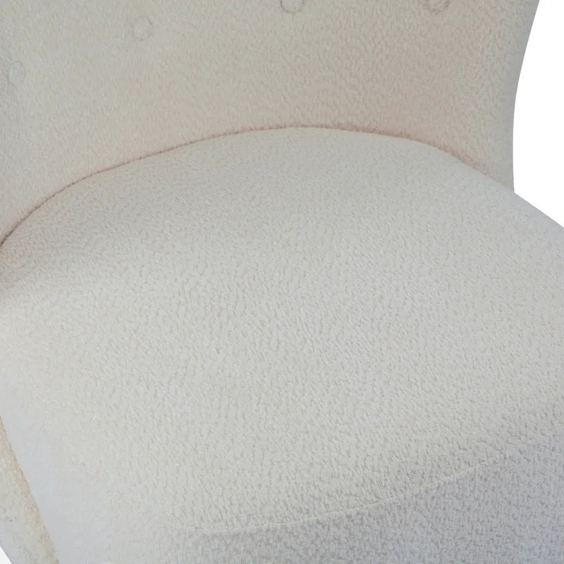 Poltroncina accentuata moderna senza braccioli Camille con seduta imbottita e struttura in legno massiccio