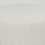 Pouf rotondo Amelia in tessuto bouclé crema con struttura in metallo nero