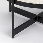 Pouf rotondo Amelia in tessuto bouclé crema con struttura in metallo nero